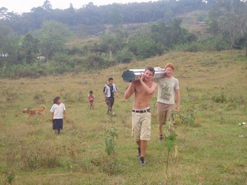 carrying bought roof.jpg