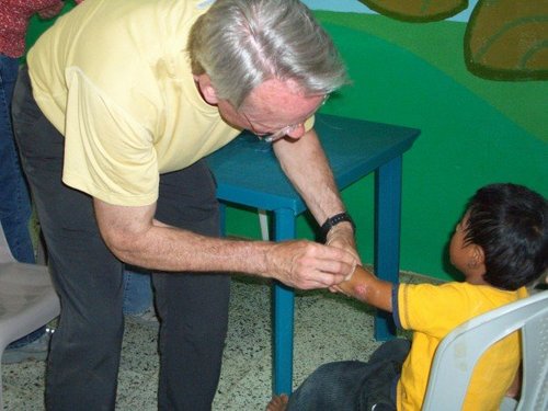 dad cleaning wound.jpg